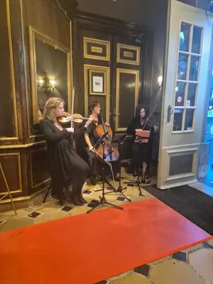 a group of people playing instruments in a room at Château à 10 minutes de Bruxelles in Beersel