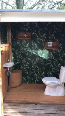 a bathroom with a toilet and a sink at Peace in Assenede