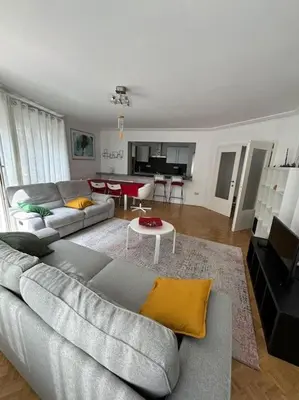 a living room with a couch and a table at Résidence 