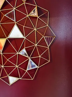 a brown wall with a geometric design on it at Cosy Boudoir Suites - 4p in Antwerp