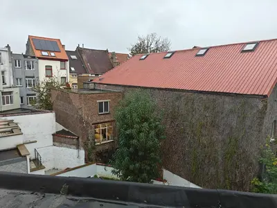 an overhead view of a building with a red roof at Acacia Etterbeek in Brussels