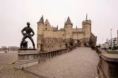 a statue of a man in front of a castle at SHWAY - The Captain's View in Antwerp