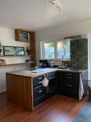 a kitchen with a sink and a counter top at Casa Mellow in Ghent