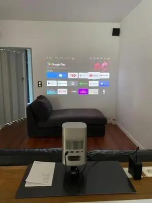 a room with a couch and a computer on a table at Casa Mellow in Ghent