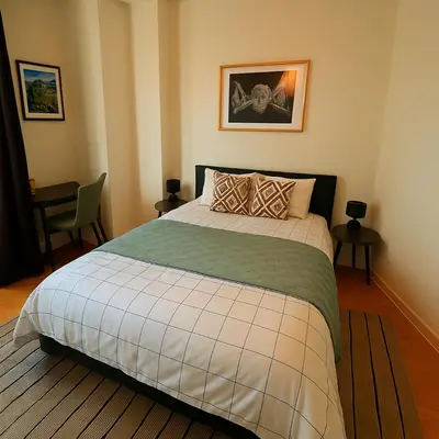 a bedroom with a large bed in a room at Brussels Central City Oasis in Brussels