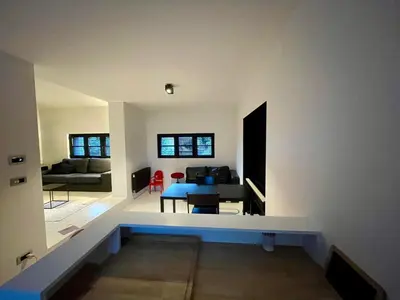 a living room with a couch and a table at Appartement à proximité de Bruxelles in Meise