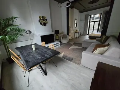 a living room with a table and a couch at 8z dreamz 2 in Ghent