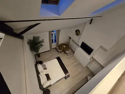 an overhead view of a living room with a table at 8z dreamz 4 in Ghent