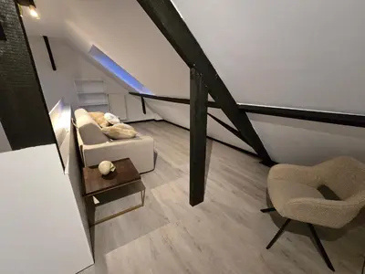 a living room with a couch and a chair at 8z dreamz 4 in Ghent