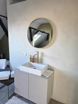 a bathroom with a white sink and a mirror at 8z dreamz 4 in Ghent