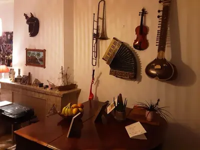 a room with a table with a bunch of instruments on the wall at Luxurious 2 bedroom appartment in Antwerp