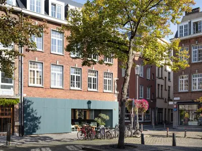 a building with bikes parked in front of it at A Place Antwerp - Boutique Suites & Flats - Leeuwenstraat 20 in Antwerp