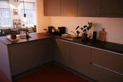 a kitchen with a counter top in a room at A Place Antwerp - Boutique Suites & Flats - Leeuwenstraat 20 in Antwerp
