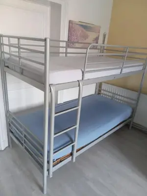 a couple of bunk beds in a room at FAMILY ROOM lux in Brussels