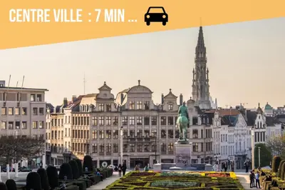 a city with a statue in front of a building at Le Refuge Historique WIFI - Parking - Confort in Brussels