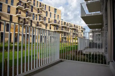 an external view of a building with a fence at Machelen in Machelen