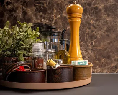 a tray with bottles and other items on a table at The Studio in Antwerp