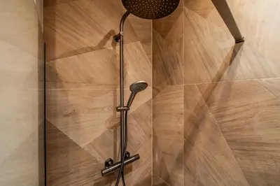 a shower with a microphone in a shower stall at BelGem in Antwerp