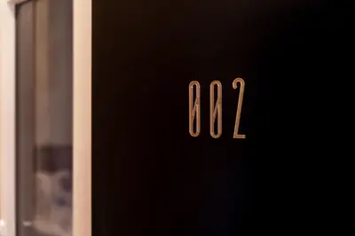 a black door with the number on it at BelGem in Antwerp