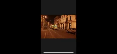 a picture of a city street at night at Room in Guest room - Charming Guest Room in Historic Brussels Mansion in Brussels
