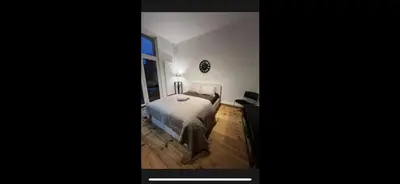 a bedroom with a bed and a lamp in it at Room in Guest room - Charming Guest Room in Historic Brussels Mansion in Brussels