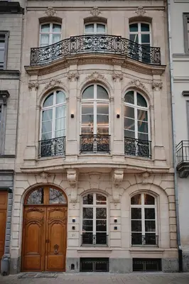 a large building with a balcony on top of it at Faubourg 21 in Brussels