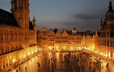 a large building with a lot of lights in it at Dodo Guest House in Brussels