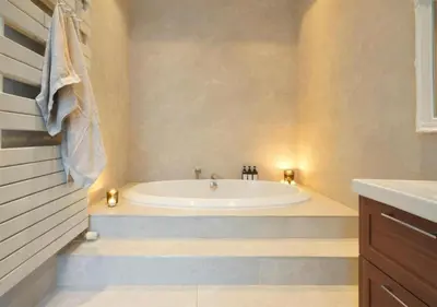 a bathroom with a tub and a sink at 2BR apartment at new Zuidpark in Antwerp
