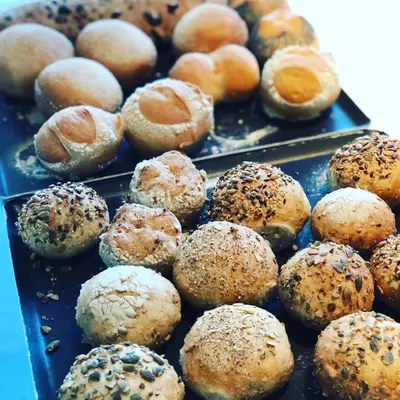 a tray filled with lots of different types of donuts at B&B Ceder10 in Kruibeke