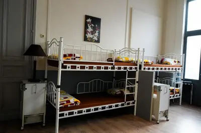 a couple of bunk beds in a room at YOUR HOSTEL midi station in Brussels
