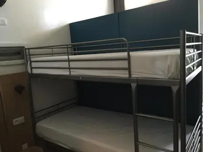 a bunk bed room with two bunk beds at Midi 81 HOSTEL in Brussels
