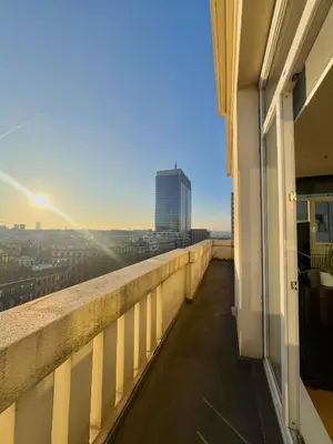 a balcony of a building with a view of a city at Lovely loft in Panoramic View! in Brussels