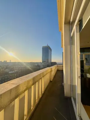 a balcony of a building with a view of a city at Lovely loft in Panoramic View! in Brussels