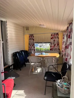 a room with a table and chairs in a tent at Nomad Laryssiou on camping GT Keiheuvel parcel 371 in Balen