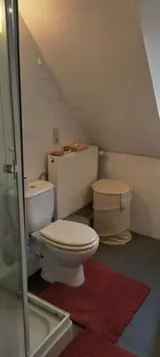 a bathroom with a toilet and a sink at Cosy apartment in Brasschaat near Antwerp in Brasschaat