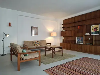 a living room with a couch and a table at Central in the heart of Brussels in Brussels