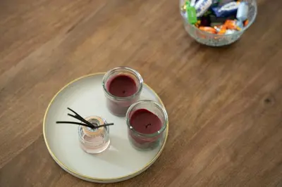 two glasses of wine on a plate on a table at Cozy and luxurious apartment in Brussels, Laeken in Brussels