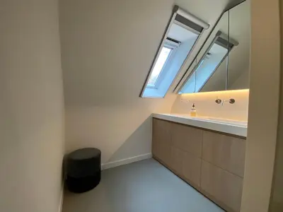 a bathroom with a sink and a mirror at Oase d'Itegem - Wellness & Luxe in Heist-op-den-Berg