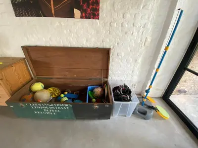 a wooden box filled with different types of vegetables at Cosy house 6 people in Kontich