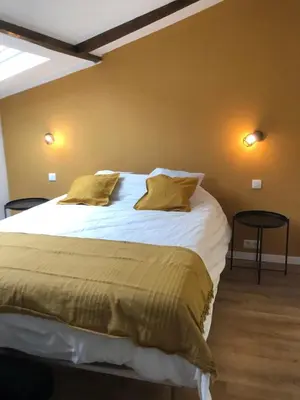 a bedroom with a large bed with white sheets and pillows at Absolute Charm 3 Bedroom 3 Bathroom with AC EU District in Brussels