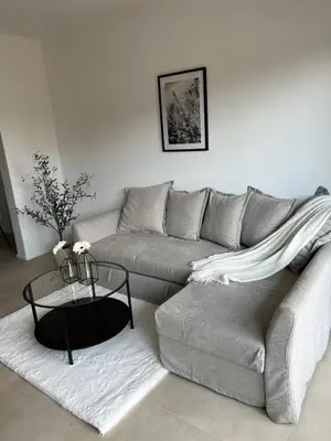 a living room with a couch and a table at Luxury Duplex near Expo 12 & ING Arena & Atomium in Wemmel