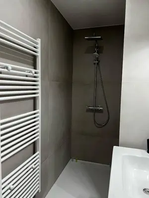 a bathroom with a shower and a sink at Luxury Apartment near Expo 12 & ING Arena & Atomium in Wemmel