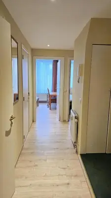 an empty hallway of a hotel room with a view of a room at Bourse Grand Place in Brussels