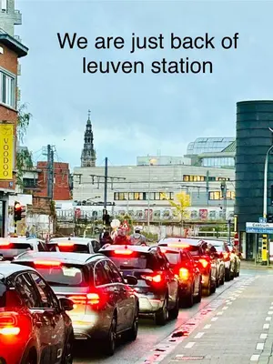 a line of cars parked on a city street at The Nest In Leuven -Cosy room near Brussels in Leuven