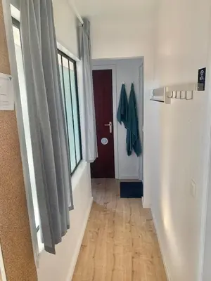 an empty hallway with a door and a hallwayngthngthngthngthngthngthngth at Green Spot Meise - 15 min from Brussels with free parking & Self check-in in Meise