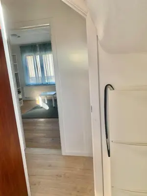 a hallway with a door leading to a living room at Green Spot Meise - 15 min from Brussels with free parking & Self check-in in Meise