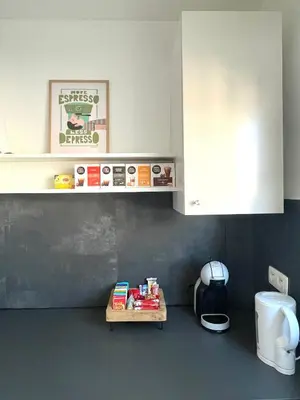 a kitchen with a table in the corner of a kitchen at Green Spot Meise - 15 min from Brussels with free parking & Self check-in in Meise