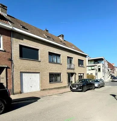 two cars parked in front of a brick building at Green Spot Meise - 15 min from Brussels with free parking & Self check-in in Meise