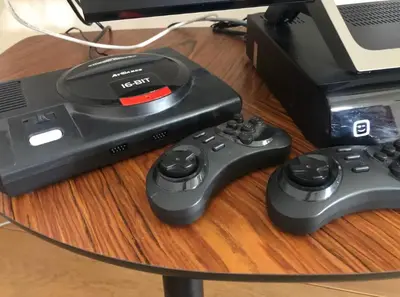 two video game controllers sitting on top of a table at Cozy & Spacious Duplex with an Amazing Terrace in Antwerp