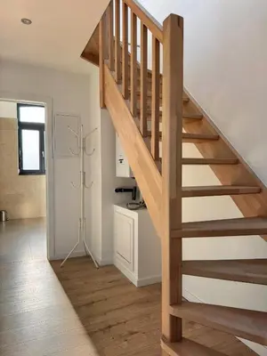a staircase in a home with wooden floors at Loft Luna Brussels Midi in Brussels